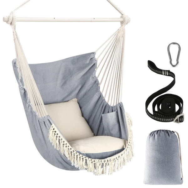 Grey fringed hanging chair with accessories on white background