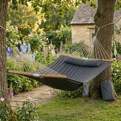 Close up of quilted hammock fabric and beechwood spreader bar
